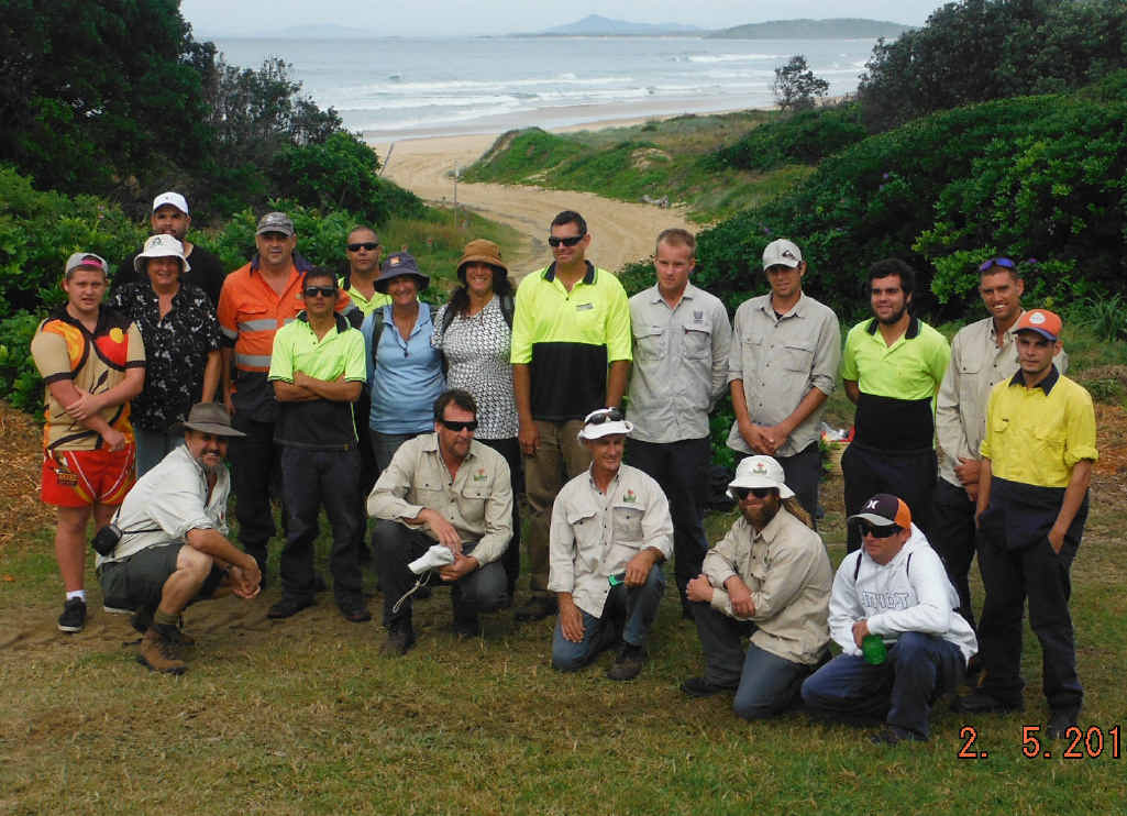 GREEN THUMBS: The local conservationists who spent a day revegetating Boambee Beach. GREEN THUMBS: The local conservationists who spent a day revegetating Boambee Beach.